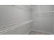 Walk-in closet with shelves at 2514 Norwood Park Crossing, Doraville, GA 30340