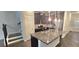 Kitchen island with granite countertop and stainless steel appliances at 2514 Norwood Park Crossing, Doraville, GA 30340