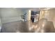 Open-concept living space featuring hardwood floors, staircase and modern kitchen with island at 2514 Norwood Park Crossing, Doraville, GA 30340