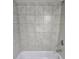 Tile shower with chrome shower head and fixtures at 2514 Norwood Park Crossing, Doraville, GA 30340