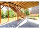 Home's backyard featuring stairs to the patio area at 4041 Woodward Walk Ln, Suwanee, GA 30024