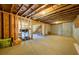 Spacious unfinished basement with exposed ceiling, ideal for future renovation and added living space at 4041 Woodward Walk Ln, Suwanee, GA 30024