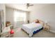 Comfortable bedroom with light-colored walls and decor at 4041 Woodward Walk Ln, Suwanee, GA 30024