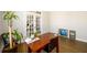 Home office featuring a desk, chair, and natural light from the large window at 4041 Woodward Walk Ln, Suwanee, GA 30024