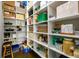 Pantry with extensive shelving and storage space at 4041 Woodward Walk Ln, Suwanee, GA 30024