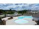 Aerial view of a community pool area with a splash pad and nearby houses, perfect for Gathering fun at 2962 Girard Ln, Duluth, GA 30097