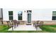 Back patio with seating, ideal for relaxing and enjoying the outdoors in a private setting at 2962 Girard Ln, Duluth, GA 30097