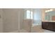 This bathroom features a tile shower, soaking tub, and a modern vanity with ample storage space at 2962 Girard Ln, Duluth, GA 30097