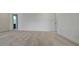 Expansive bedroom with plush carpeting and access to a bathroom, highlighted by abundant natural light and fresh, neutral tones at 2962 Girard Ln, Duluth, GA 30097