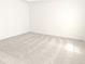 The bedroom has neutral carpet, base trim and walls at 2962 Girard Ln, Duluth, GA 30097