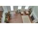 Aerial view of the living room shows open layout with fireplace and comfortable seating at 2962 Girard Ln, Duluth, GA 30097