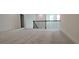 Upstairs carpeted loft space with railing at 2962 Girard Ln, Duluth, GA 30097