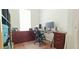 Well-lit home office space with modern desk, ergonomic chair, and ample storage at 2962 Girard Ln, Duluth, GA 30097