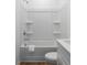 This bathroom features a shower and tub with a modern white vanity at 4856 Allatoona Gtwy # 8, Acworth, GA 30101