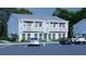Newly constructed white townhome with a charming balcony, ample parking available at 4856 Allatoona Gtwy # 8, Acworth, GA 30101
