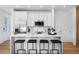 Modern white kitchen with quartz countertops and stainless steel appliances at 4856 Allatoona Gtwy # 8, Acworth, GA 30101