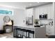 Contemporary kitchen featuring a large island with barstool seating, stainless steel appliances, and modern finishes at 4856 Allatoona Gtwy # 8, Acworth, GA 30101
