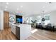 Spacious living area with a modern island, seamlessly connecting to dining at 4856 Allatoona Gtwy # 8, Acworth, GA 30101