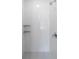 Bathroom shower featuring white tiled walls and silver fixtures at 4856 Allatoona Gtwy # 8, Acworth, GA 30101