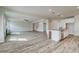Expansive living room with open floor plan leading to kitchen and staircase at 512 Dolce Rd, Locust Grove, GA 30248