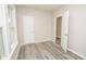 This bedroom features hardwood flooring and natural light from the window at 1889 Vesta Ave, Atlanta, GA 30344