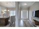 Inviting entryway with hardwood floors, modern lighting, and a view of the adjacent dining room at 200 Eva Way Ne, Cartersville, GA 30121