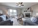 Bright and inviting living room with a fireplace and comfortable furnishings at 200 Eva Way Ne, Cartersville, GA 30121