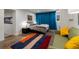 Cozy bedroom with blue curtains and a green sofa at 318 5Th Ne St, Atlanta, GA 30308