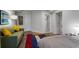 Bedroom features a comfortable green sofa and unique flooring at 318 5Th Ne St, Atlanta, GA 30308