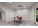 Cozy dining area features a wooden table, modern chairs, and tile flooring at 318 5Th Ne St, Atlanta, GA 30308