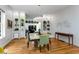 Bright dining room with hardwood floors, modern lighting, and stylish decor at 318 5Th Ne St, Atlanta, GA 30308