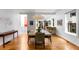 Stylish dining room featuring hardwood floors, modern lighting, and a welcoming ambiance at 318 5Th Ne St, Atlanta, GA 30308