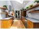 Updated kitchen featuring modern appliances, floating shelves, and a bright, airy feel at 318 5Th Ne St, Atlanta, GA 30308