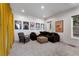 Cozy living room perfect for relaxing and entertaining with a big comfy couch and warm lighting at 318 5Th Ne St, Atlanta, GA 30308