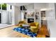 Comfortable living space with a fireplace, hardwood flooring, and bright windows at 318 5Th Ne St, Atlanta, GA 30308