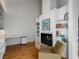Modern office space equipped with custom desk, shelving, and a cozy armchair at 318 5Th Ne St, Atlanta, GA 30308