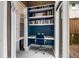 Charming office nook with built-in shelving, perfect for a quiet workspace and with sliding glass door access to the deck at 318 5Th Ne St, Atlanta, GA 30308