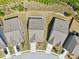 Bird's-eye view of the property, highlighting roof lines, landscaping, and driveway at 3382 Long Creek Dr, Buford, GA 30519