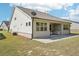 Backyard featuring a concrete patio and a well-maintained lawn at 3382 Long Creek Dr, Buford, GA 30519