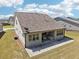 Enjoy this home's expansive patio area, perfect for outdoor entertaining and relaxation at 3382 Long Creek Dr, Buford, GA 30519
