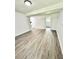 Finished basement with vinyl plank flooring, recessed lighting, and neutral paint at 8399 Lake Dr, Snellville, GA 30039