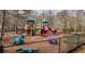 Community playground with slides, climbing structures, and play equipment at 8399 Lake Dr, Snellville, GA 30039