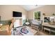 Bedroom featuring wood look floors, neutral paint and multiple items for baby care at 13 Four Feathers Ln, Rydal, GA 30171