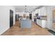 Kitchen with a large center island, granite counters, stainless steel appliances, and lots of cabinet space at 13 Four Feathers Ln, Rydal, GA 30171