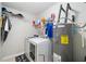 Efficient laundry room with washer, dryer, and water heater, offering convenience at 13 Four Feathers Ln, Rydal, GA 30171