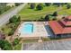 Community pool and lounge area featuring ample seating and manicured landscaping offering a refreshing outdoor experience at 13 Four Feathers Ln, Rydal, GA 30171