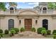 Detailed shot of the front exterior showcasing the architectural details, lighting and landscaping at 3212 Arden Nw Rd, Atlanta, GA 30305