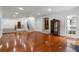 Spacious living area boasting hardwood floors, staircase, and ample natural light at 3212 Arden Nw Rd, Atlanta, GA 30305