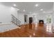 Bright living room with high ceilings, hardwood floors, and fireplace at 3212 Arden Nw Rd, Atlanta, GA 30305