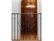 Staircase with decorative iron railing and wood flooring, blending functionality with sophisticated style at 3212 Arden Nw Rd, Atlanta, GA 30305